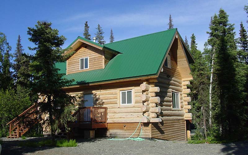 Exterior view of main cabin at All Alaska Outdoors lodge