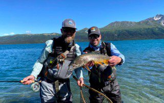 group-angler-posing-lake-trout-fish-wade-2021-2-11