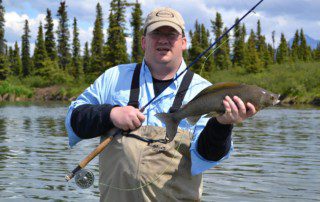 single-angler-posing-grayling-fish-wade-2021-2-1