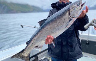 single-angler-posing-king-salmon-boat-2021-2-1