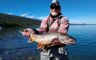 single-angler-posing-lake-trout-fish-wade-2021-2-11
