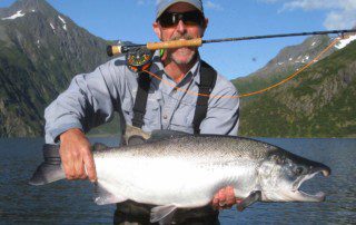 single-angler-posing-silver-salmon-fish-wade-2022-2-1