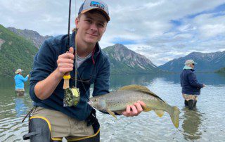 single-angler-posing-arctic-grayling-fish-wade-2021-11-16 Click this image button to go to the "Grayling" page