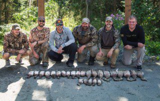 group-hunter-posing-ptarmigan-bird