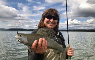 single-angler-posing-grayling-fish-wade-2022-5-17