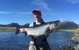 single-angler-posing-silver-salmon-fish-2022-5-13