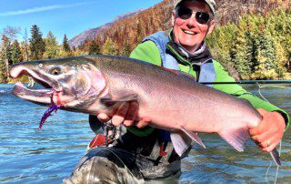 single-angler-posing-silver-salmon-fish-wade-closeup-2022-5-13