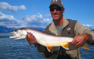 single-angler-posing-trout-fish-wade-2022-5-17